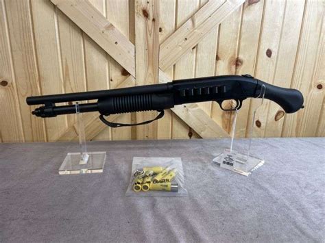 Mossberg Model 590 20 Gauge Pump Shotgun Aumann Auctions Inc