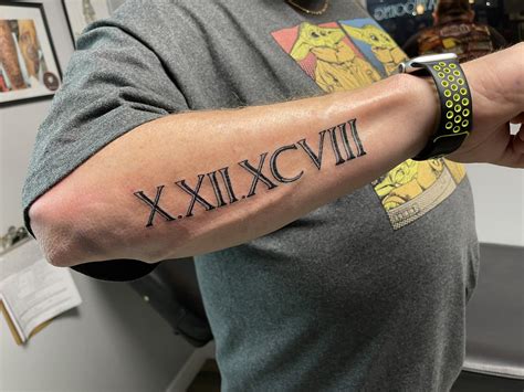 Roman Numerals Tattoo Designs On Wrist